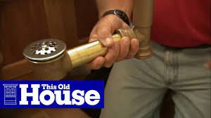 Do i fish out a bathtub drain stopper repair. How To Fix A Bathtub Drain Stopper This Old House Youtube