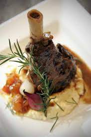Moroccan Spiced Braised Lamb Shank With Roasted Shallots Rosemary Stewed Tomatoes And Mashed Potat Slow Cooked Lamb Slow Cooked Lamb Shanks Lamb Shank Recipe