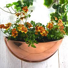 From small garden pots to long garden planters. Copper Half Moon Wall Planter By London Garden Trading Notonthehighstreet Com