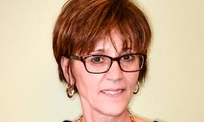 Kathy Metz receives 2014 Messinger Award for leadership in patron services