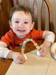 Edible rainbows made with marshmallows and fruit loops