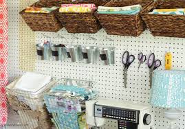 This board blends into the wall decor with a farmhouse styled frame and neutral colours. How To Install A Diy Giant Pegboard Wall Craft Room Makeover The Happy Housie