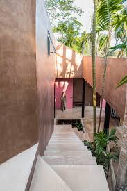 The Two Storey Structure Has A Hollow Centre Filled With Lush Foliage Similar To Its Surroundings Architecture Exterior Design Space Architecture