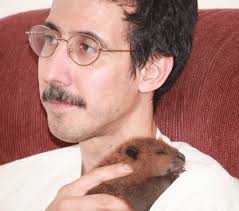 TBT Vinny, burping a baby beaver after her feeding. Yes, you do need to  burp beavers