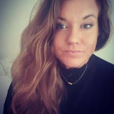 Woman displays a scene where she tried creating a roadside video using  Davido's new sound, but quickly stepped away after a passerby with an  unusual outfit made an unexpected attempt to dance