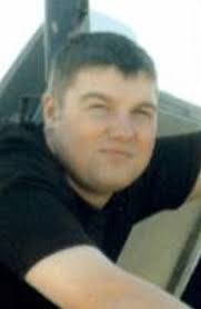 Town stands still to honour fallen son