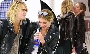 Despite what the tabloid laimed, benson and delevingne are not married. Cara Delevingne And Girlfriend Ashley Benson Lay On The Pda At Jfk Daily Mail Online