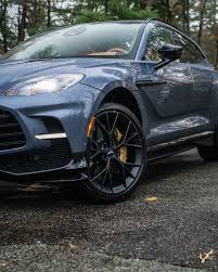 Image result for Concours Blue 2024 Aston Martin