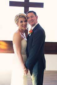 It S Impossible To Have A Wedding At The Cave Creek Chapel And Not Get A Photo In Front Of The Cross And Historic Wedding Wedding Ceremony Sites Chapel Wedding