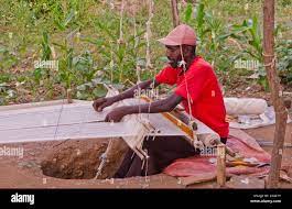 Gamo Gofa Ethiopia Africa man weaving in Gamo Tribe traditional methods  weave scarf #11 Stock Photo - Alamy