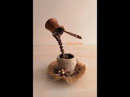The Coffee Waterfall Flowing From Pot Cezveden Dokulen Kahve Selalesi Youtube Tea Cup Centerpieces Coffee Bean Art Floating Tea Cup