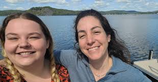 Seniors Matthew Stoddard, Jorja McLeod, and Julie Griffith present their  work at the Senior Art Exhibit, which is currently