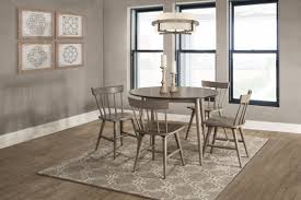 Our all metal slatted spindle chair back exudes an airiness while the turned lip seat conveys solid warmth, this chair is both sturdy and stylish with its clean black. Mayson 5 Piece Round Dining Set With 4 Spindle Back Chairs Gray With Chocolate Finish Top