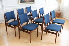 The table has extendable leaves. Mid Century Modern Teak Dining Chairs In Navy Blue Set Of 8 No 627 Shopgoldenpineapple