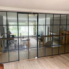 Industrial style glass doors are one of our popular door option, offering an elegant and industrial appearance. Domestic Client Southport Glass Walls And Doors