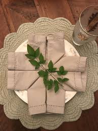 The cutlery parcel napkin folding idea. Napkin Folded To Look Like Cross For Easter Napkin Design Napkin Folding Dinner Party Themes