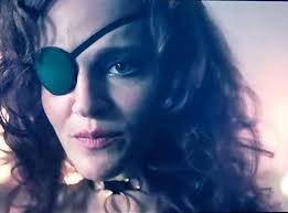 Meow! I just realized the irony of the show writers having written in a  part for Janine as a Jezebel “kitty kat” for creepy Comm Bell. Janine  definitely has NINE LIVES!!! How