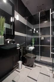 Black Is Not A Colour That Immediately Springs To Mind For A Bathroom Decor But With Plenty Of Black Bathroom Decor Modern Bathroom Black Bathroom Accessories