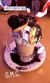 The label on the first product now says syrup with calcium rather than syrup+calcium. Here S Where To Go For A Crazy Milkshake With Whole Cookies On It Step Out Buffalo