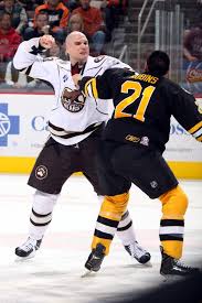 03 30 13 Hershey Bears Defenseman Patrick Wellar In A Scramble With Providence Bruin Bobby Robins Photo Cou Hershey Bears Providence Bruins Hockey Boards