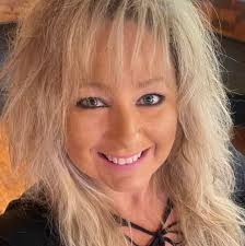 Evan Charles McLemore is accused of harassing his family with Coldplay  lyrics and threats of violence from his "Nazi prison associates."