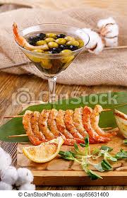Best 20 cold marinated shrimp appetizer. Cold Appetizer Of Shrimps With The Original Serving Of Olives In An Elegant Glass Rustic Still Life Canstock
