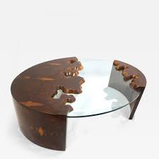 Available in two shapes (oval and round), as well as two colors (pink and gray), this table. Bespoke 1980 Italian Organic Walnut Veneer Glass Oval Coffee Table With Drawer
