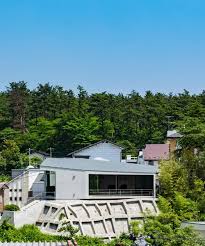 The area of a rectangular wall of a barn is 224 square feet. Ginga Architects Builds Concrete House On Top Of A Retaining Wall In Japan