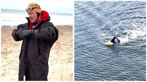 Clive Newton urges hesitant open water swimmers to 'give it a go'