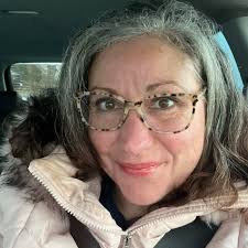 How to help a homeless woman in Racine, WI?