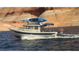 The boat is provided with two fishing rod holders, as well as inflatable seat cushions, gear pouch, oar holders, and backrest. Pin On C Dory Boats Cruisers That Can Trailer Go Fishing Scuba Diving