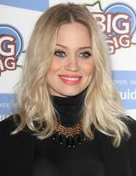 Pregnant Kimberly Wyatt with her hair curled away from her face
