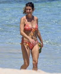 She established her beauty and lifestyle. Kate Walsh At The Beach In Perth 12 22 2020 Celebmafia
