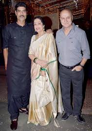 Anupam kher works in the bollywood film industry and has. Anupam Kher With Wife Kirron And Son Sikander Brides Mom Dress Saree Trends Cotton Long Dress