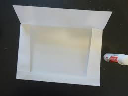 If you lightly score your envelope (with your fingernail or a paper clip) along the edges of the card it will make it easier to fold. Make Your Own Greeting Card Envelope