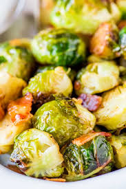 Maple Brussels Sprouts With Bacon Oven Roasted Brussels Sprouts Flavored With Crispy Bacon And Sweet Mapl Brussel Sprouts Bacon Brussel Sprouts Sprout Recipes
