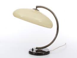European design was heavily influenced by this (here, there mies van der rohe and marcel breuer !) and designers everywhere concurred that the focus should be on both style and function. Mid Century Modern Desk Lamp In Opal Galerie Mobler