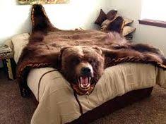 I prefer faux fur or fake bear skin rugs, but many sportsmen like the idea of an authentic black bear skin rug. 53 Bear Rugs Ideas Bear Rug Bear Rugs