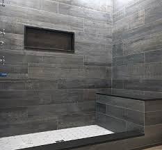 This tiny bathroom is made to feel much larger by the inclusion of mirror all around the room. Top 50 Best Shower Bench Ideas Relaxing Bathroom Seat Designs