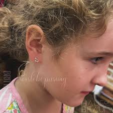 This gorgeous girl got her first lobe piecing ✨