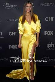 Tracee ellis ross was born on october 29, 1972 in los angeles, california, usa as tracee joy silberstein. Iris Mittenaere Yellow Wrap Deep V Neck Evening Gown With Sleeves 2017 Miss Universe Pageant Red Carpet Thecelebritydresses