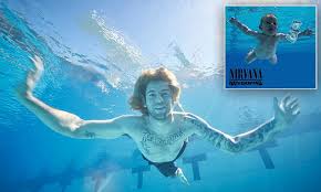 Elden was four months old when kirk weddle photographed him for the cover of nevermind, which is widely considered nirvana's seminal album. Nirvana S Nevermind Album Baby Recreates Iconic Photo 25 Years Later Daily Mail Online