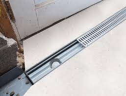 I am considering rebuilding my existing garage and adding an area about 14 feet by about 20 feet. Trenchdrain Basement Garage Entry Drainage