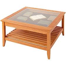 Opens in a new tab. Manchester Wood Glass Top Display Square Coffee Table Golden Oak Buy Online In Bahamas At Bahamas Desertcart Com Productid 39551530