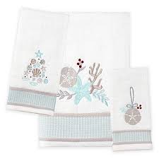 Rated 3.5 out of 5 stars. Bring A Wintry Vibe To Your Beach Themed Bathroom Decor With The Coastal Christmas Hand Towel Em Christmas Hand Towels Christmas Bath Towels Coastal Christmas