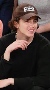 Only Timothee Chalamet Would Wear A Cap Like This To A Basketball Game Timothee Chalamet Lil Timmy Tim Timmy Tim
