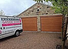 It does not 'pull' away from the garage like an up and over door, and so will open even when a car is parked. Lumino Garage Doors Luxury Sectional Garage Doors Automatic Sectional Garage Doors