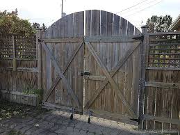 How To Build And Install Wood Fence Gate Heavy Wide Wooden Fence Gate Will Tend To Put Pressure On The Posts Wood Fence Gates Fence Gate Fence Gate Design