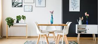 The designer sectioned off a tiny corner and turned it into the dining booth, with a table that extends out to double its length. 5 Clever Ways To Create A Dining Room In A Small Apartment Rentcafe Rental Blog