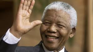 Former South African president Nelson Mandela waves to the crowd during a ceremony in Quebec, where he was presented with an honourary Canadian citizenship ... - nelson-mandela-20131205